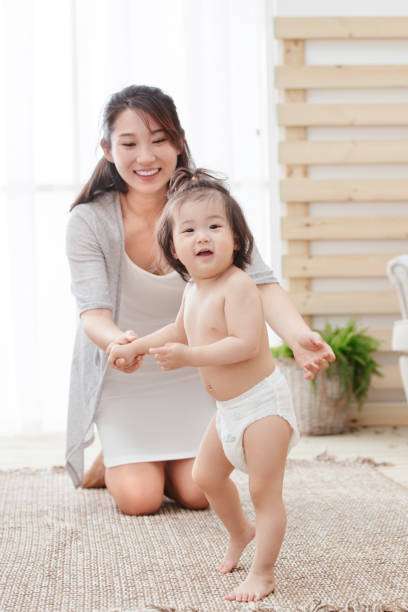 istock Happy mother and daughter play 1242988087