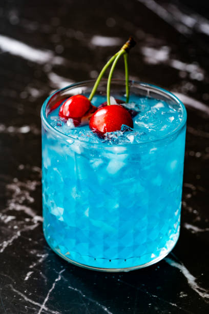 istock Blue Lagoon Cocktail with Cherries and Crushed Ice. 1243004749