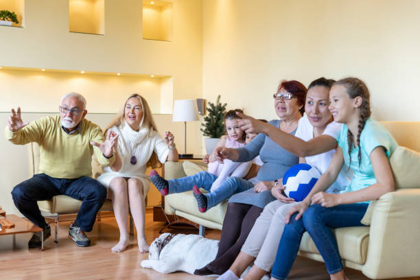istock Cheerful Multi-Generation Family is Supporting National Soccer Team at Home. 1243014532