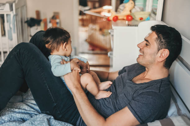 istock Father having fun with his baby boy 1243034075