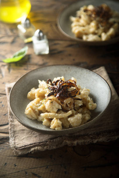 istock Noodles with cheese and onion 1243034159