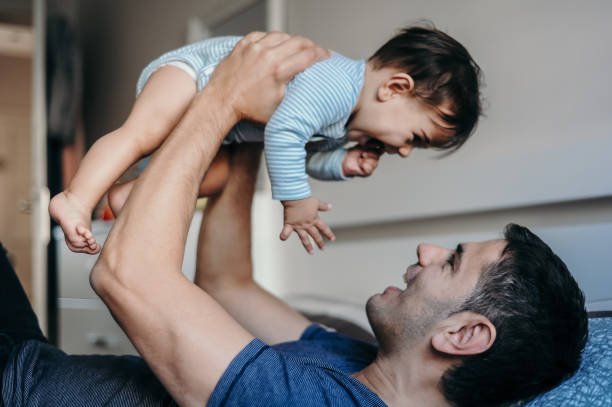 istock Father having fun with his baby boy 1243034759