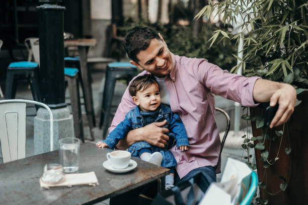 istock Father and baby boy taking selfie 1243035269