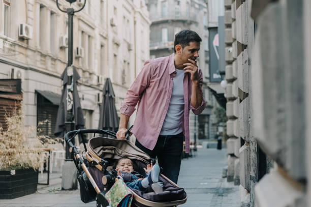 istock Father and his baby boy window shopping 1243035304