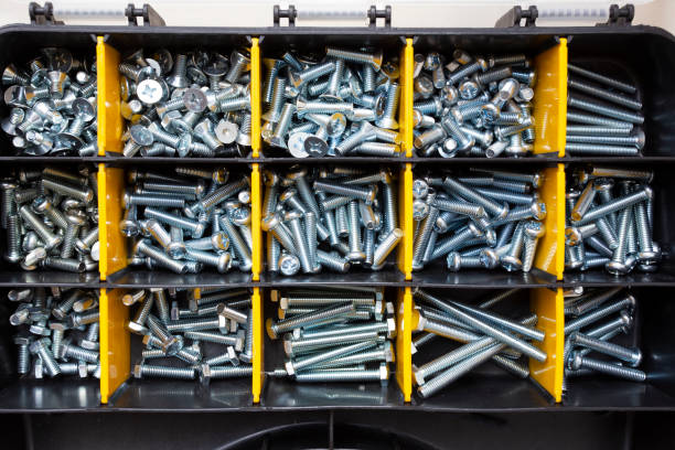 istock Tool box with nails, screws and another equipment, engineering and repair or maintenance concept 1243039128