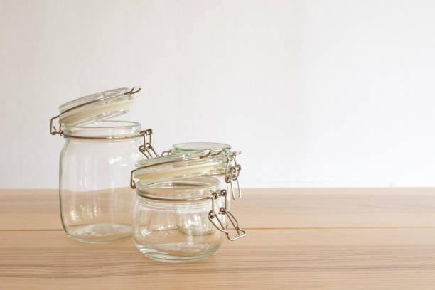 istock Empty reusable glass jar on white background, sustainable eco friendly lifestyle zero waste concept. 1243048848