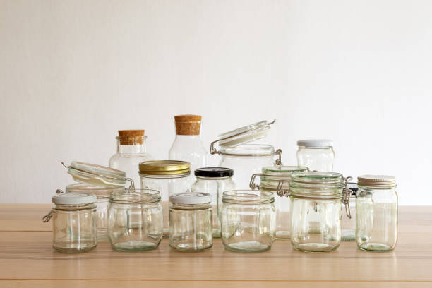 Empty reusable glass jar on white background, sustainable eco friendly lifestyle zero waste concept.