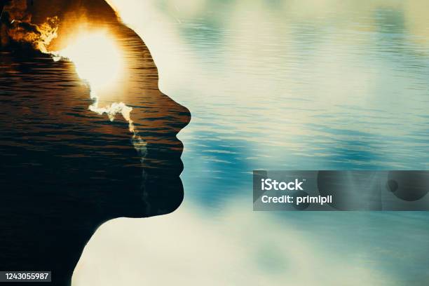 Woman Silhouette With Sun In Head With Copy Space Multiple Exposure Image Stock Photo - Download Image Now