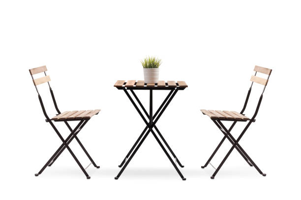 studio shot of a wooden table with two chairs - bar chairs imagens e fotografias de stock