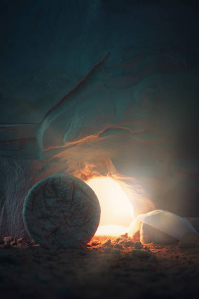 Empty tomb of Jesus Christ with light. Born to Die, Born to Rise. "He is not here he is risen". Savior, Messiah, Redeemer, Gospel. Alive. Christian Easter concept. Jesus Christ resurrection. Miracle stock photo