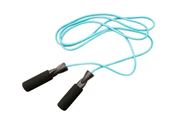 Blue skipping rope or jump rope isolated on white background, top view