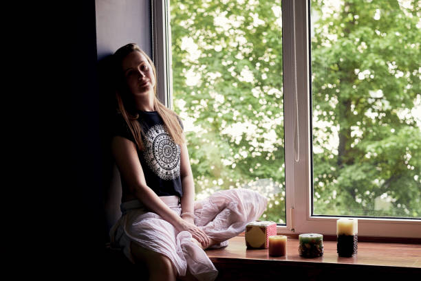 istock Young woman isolated at home 1243095921
