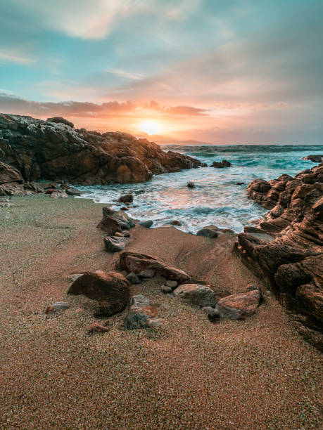 Sunset on the sea at Los Cristales beach in Laxe, Galicia, Spain.