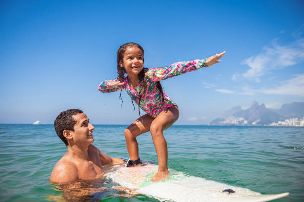 Father and daughter surf day