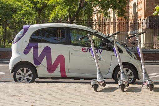 Berlin, Germany - 9th September, 2022: Electric cars parked on a public parking. Often find a free parking place in the city center is a very difficult.