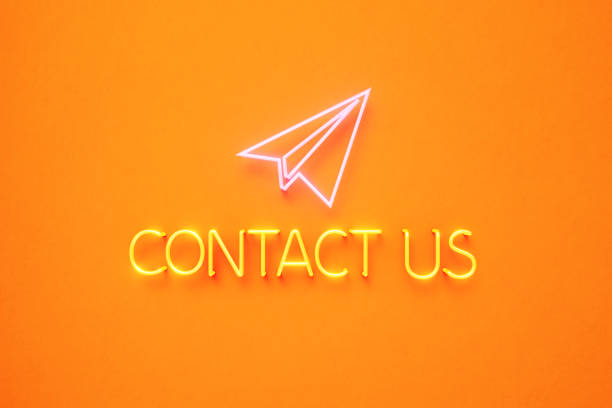 istock Plane Symbol Formed by Yellow Neon Light on Yellow Background 1243192311