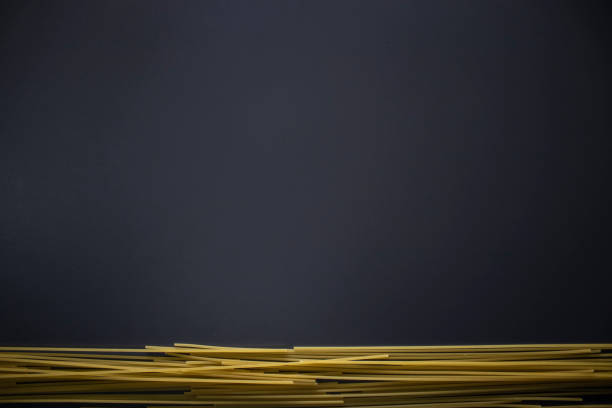 spaghetti on gray background, top view, copy space. Food supplies, food donation on quarantine while coronavirus