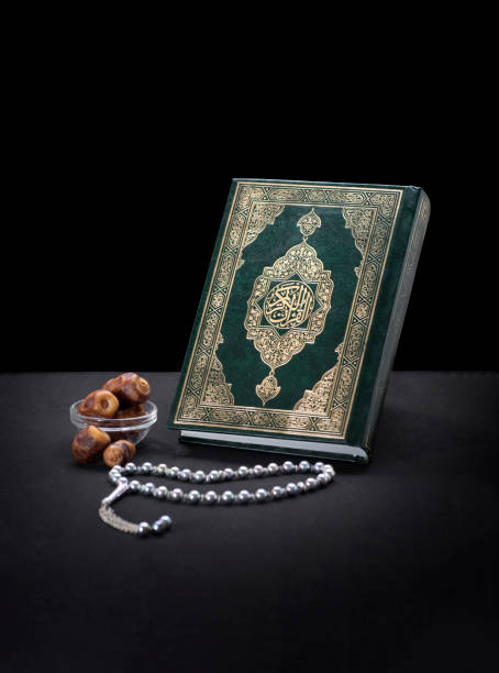 istock Holy Quran Book With Rosary and Dates 1243195749