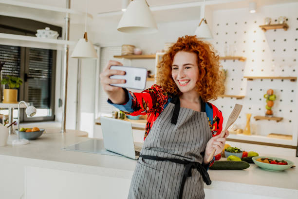 istock Woman is recording vlog about healthy eating 1243201534