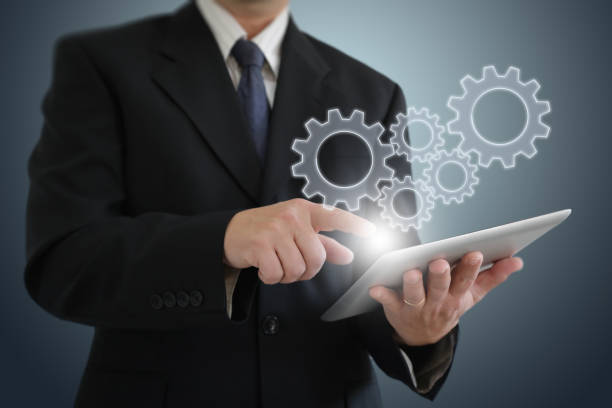istock Teamwork cogwheel cooperation businessman togetherness partnership 1243202068