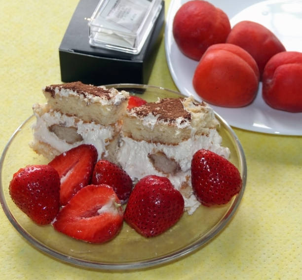 istock Cake and strawberries on a plate 1243218170