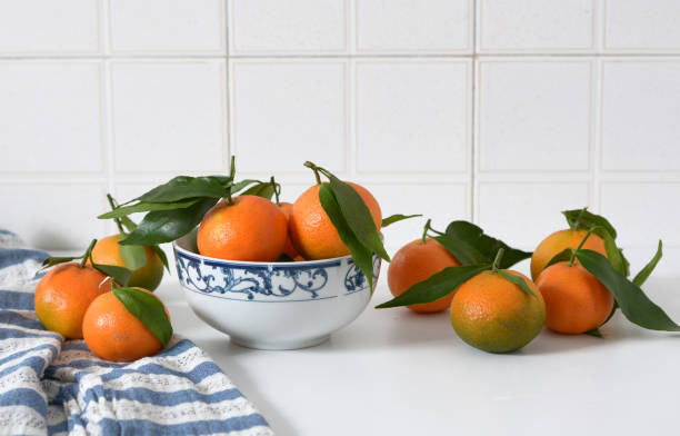 istock pile of tangerines on the kitchen table 1243218174