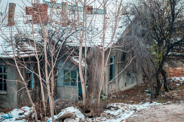 istock Neglected ruined and destroyed building slowly falling apart 1243219796