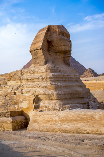 The Sphinx and the Pyramids of Giza, wonders of the world in Egypt, sunset view