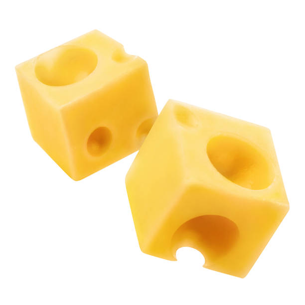 istock Close-up of two delicious cheese cubes on white 1243237311