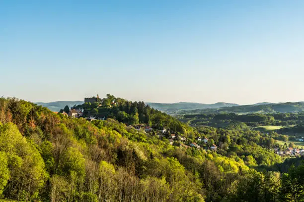 The Odenwald - a low mountain range in the German states of Hesse - with small town Lindenfels and castle, Germany