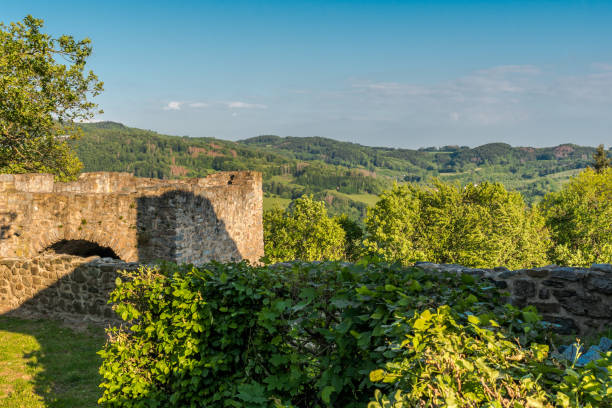 Green Hilly Landscape Around Castle Ruin Lindenfels in the Odenwald. Hesse, Germany Green Hilly Landscape Around Castle Ruin Lindenfels in the Odenwald. Hesse, Germany odenwald photos stock pictures, royalty-free photos & images