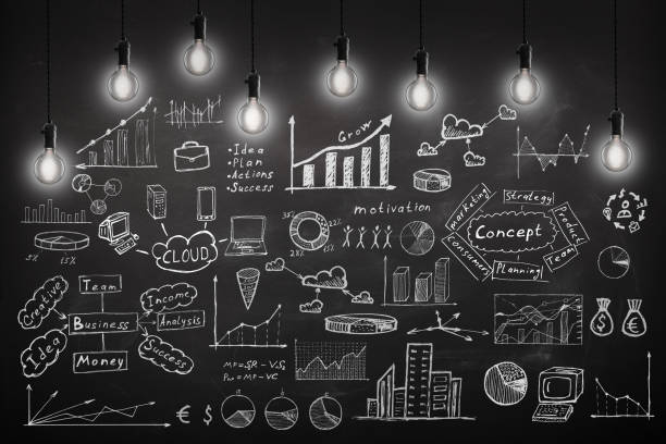 istock concept - sketch with schemes and graphs on chalkboard 1243246108