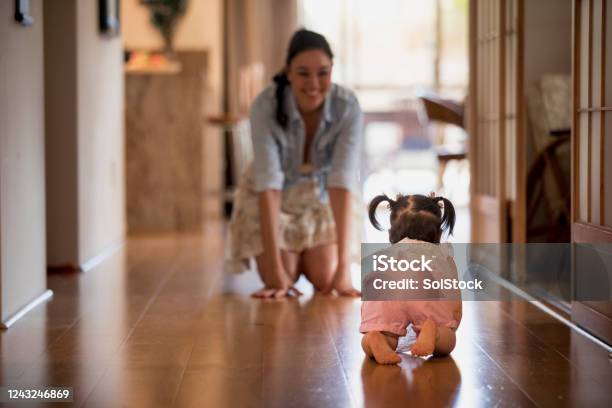 Learning To Crawl Stock Photo - Download Image Now - Life Events, Baby - Human Age, Crawling