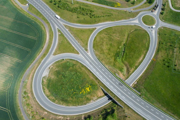 istock Road junction and traffic circle - aerial view 1243247311