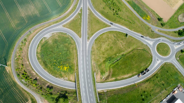 istock Road junction and traffic circle - aerial view 1243247335