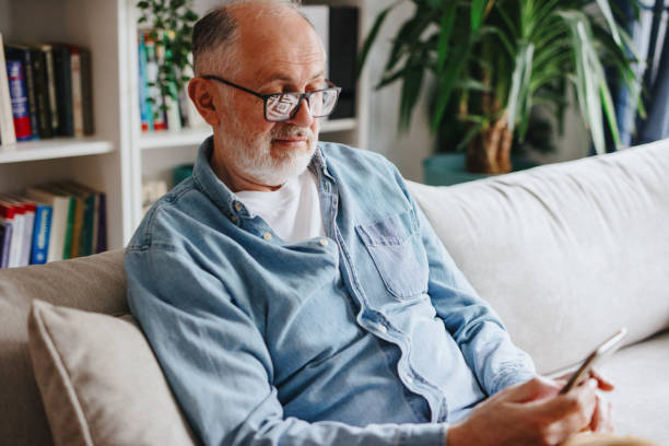 istock Senior man addicted to social media texting 1243248552