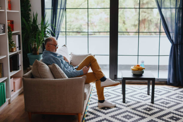 istock Senior man addicted to social media texting 1243249093