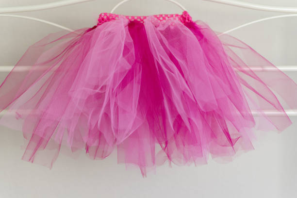 Pink tutu hanging up on clothes rail