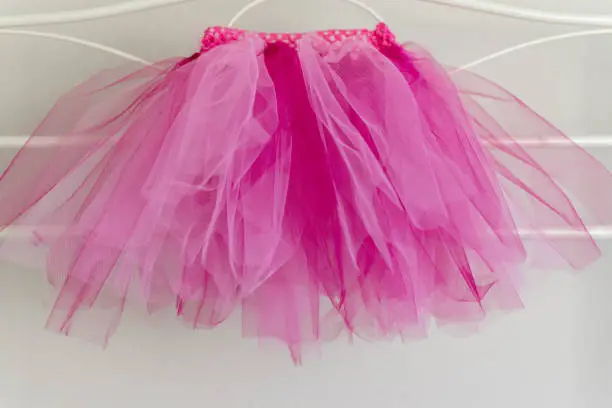 Photo of Pink tutu hanging up on clothes rail