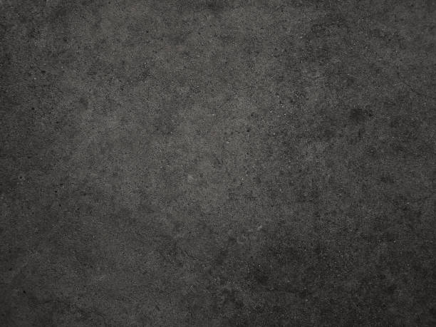 istock Dark cement wall background in vintage style for graphic design 1243257390