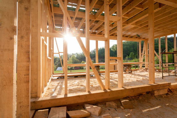 istock Interior frame of new wooden house under construction 1243260125