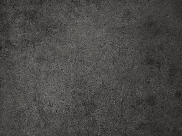 istock Dark cement wall background in vintage style for graphic design 1243262907