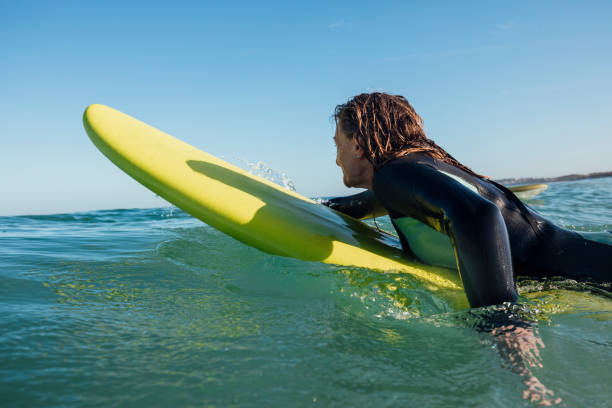 istock Paddling out to Surf 1243300858