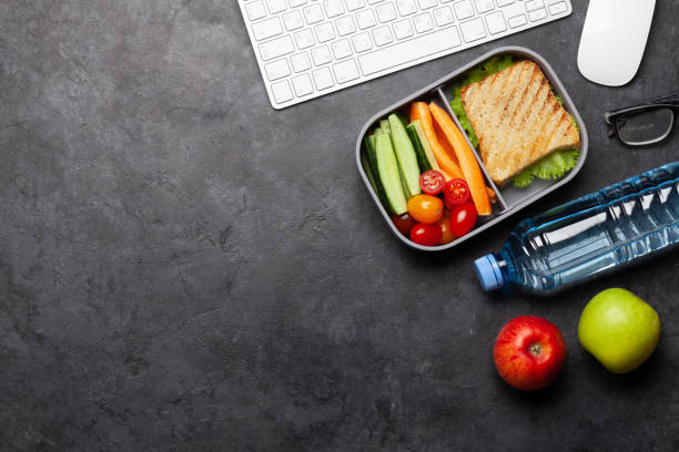 istock Healthy lunch box with sandwich and vegetables 1243301400