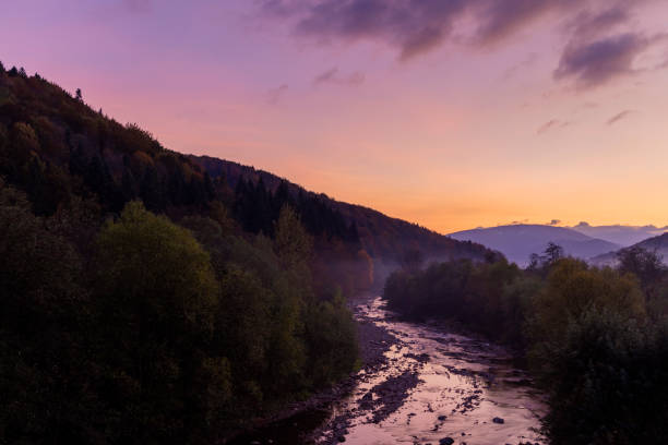 istock misty autumn mountain forest landscape morning sun rise time scenic view twilight lighting 1243311708
