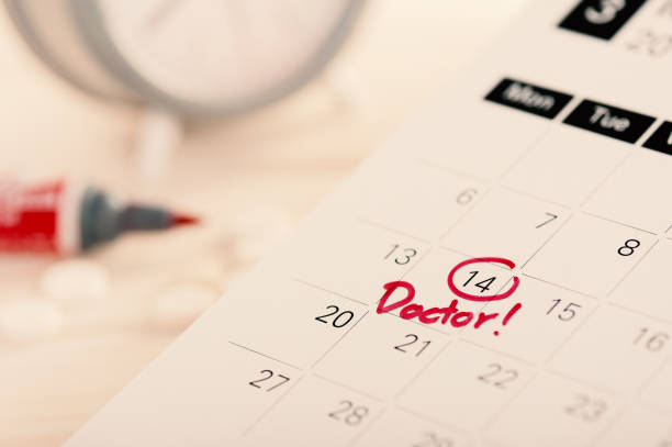istock Doctor appointment on calendar 1243312780