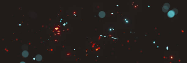 istock blurred cyan and red sparks from neon lights in front of black backgound 1243316538