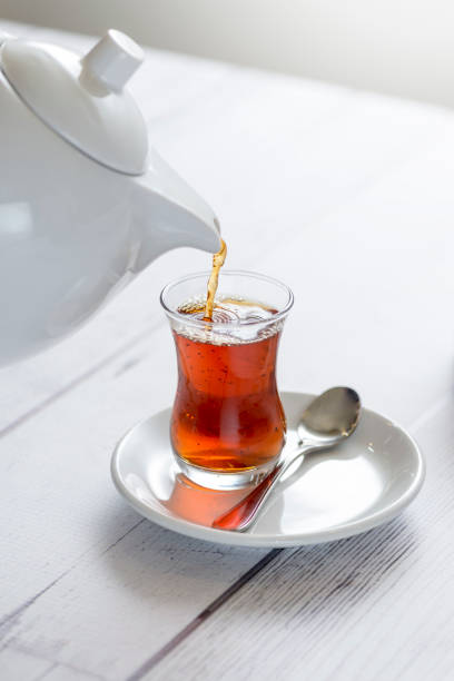 istock Pouring Morning Cup of Tea 1243337040