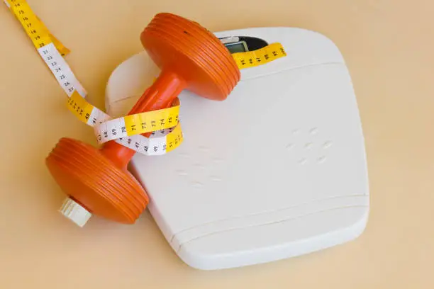 After the diet weigh yourself, measure the lost centimeters and  and tone the body with weights