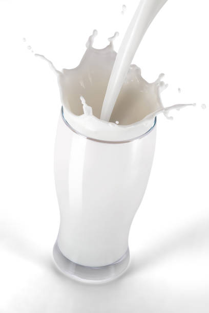 istock Pouring Fresh Milk Splash 1243382658